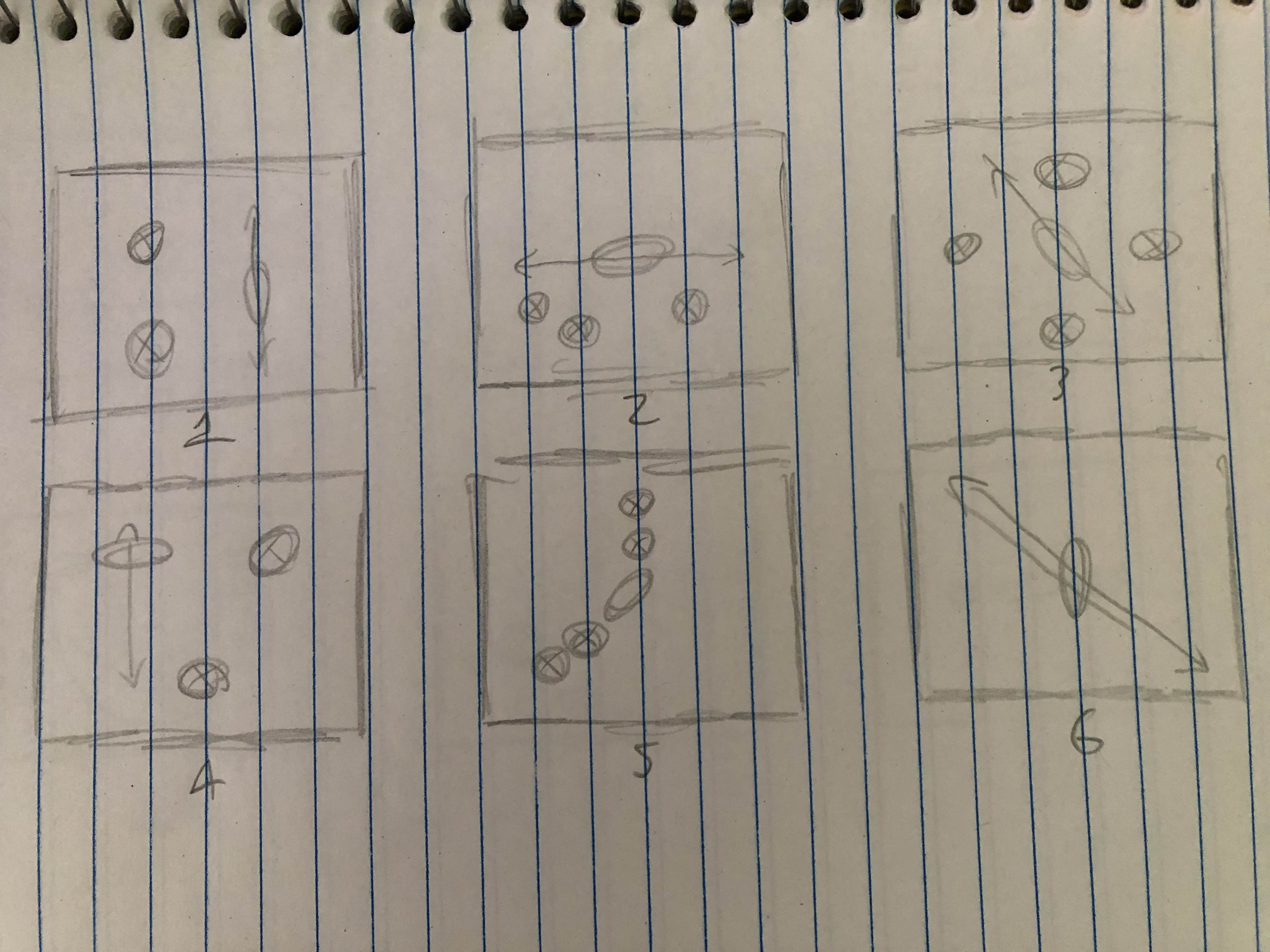 Sketches of stage layouts, drawn physically inside a lined notebook.
