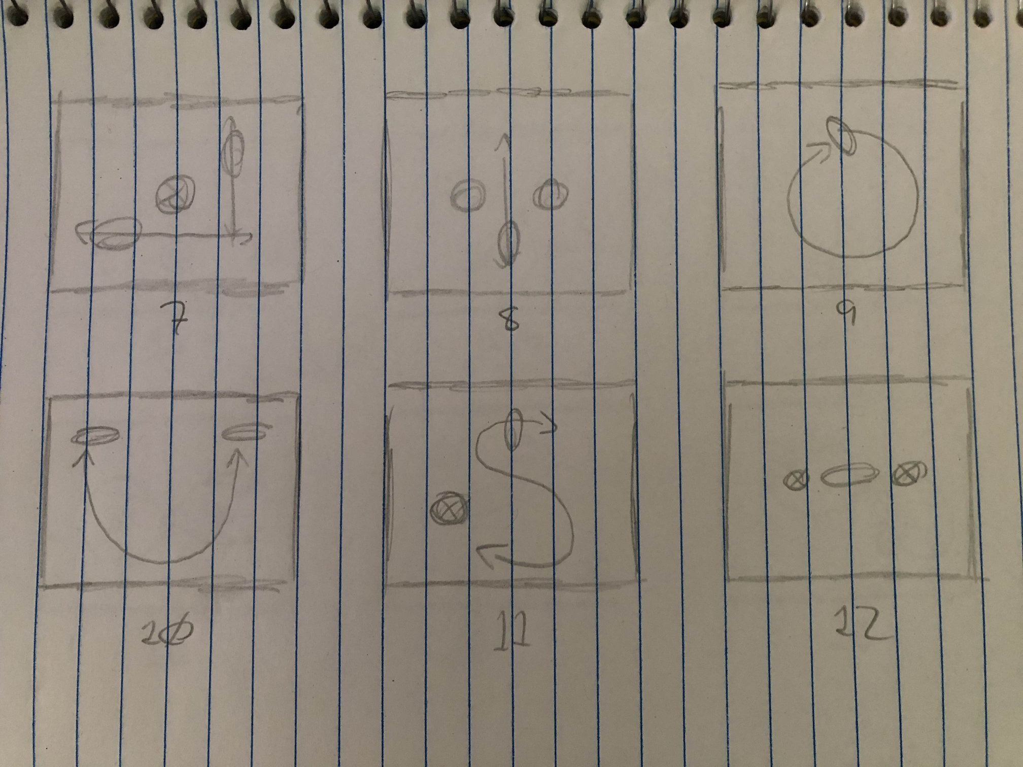 Sketches of stage layouts, drawn physically inside a lined notebook.